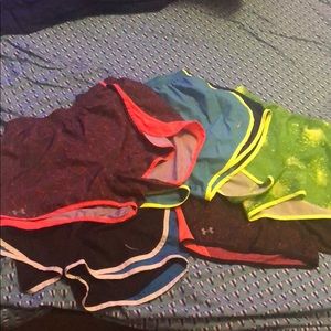 Nike/Under Armour Women’s Medium running shorts.